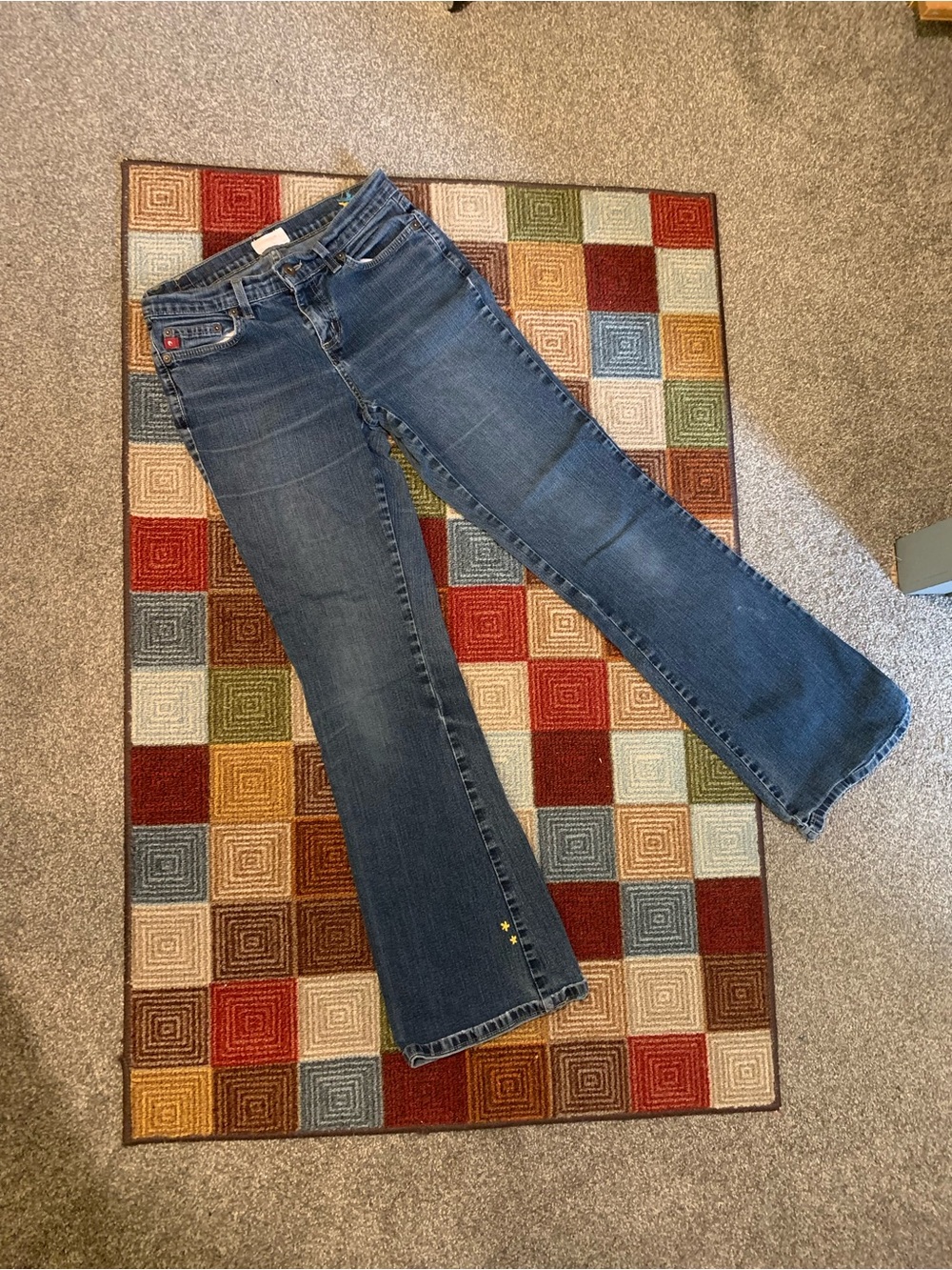 Mid rise flare leg blue jeans